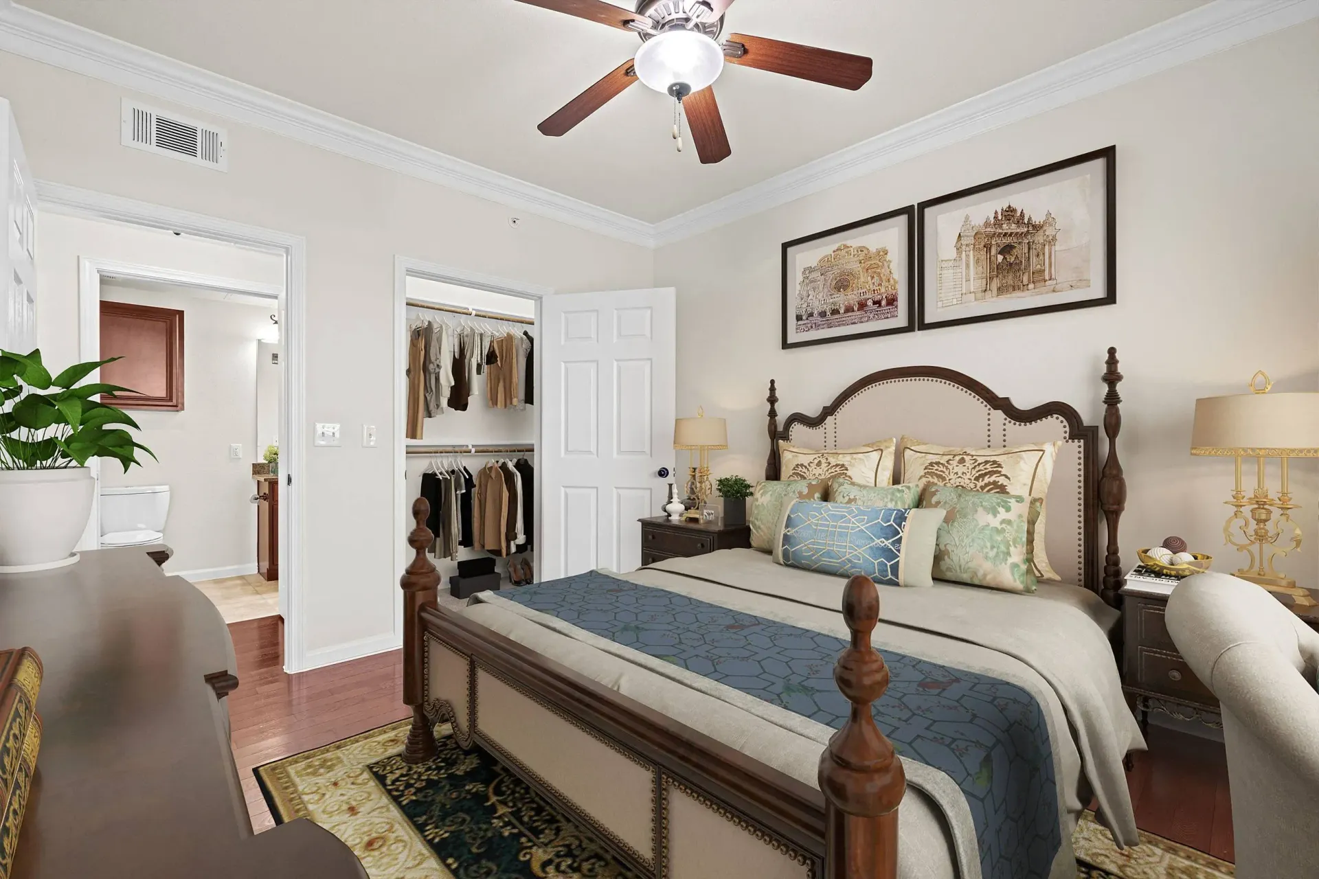 Bedroom with a large bed, open closet, and doorway to a bathroom.