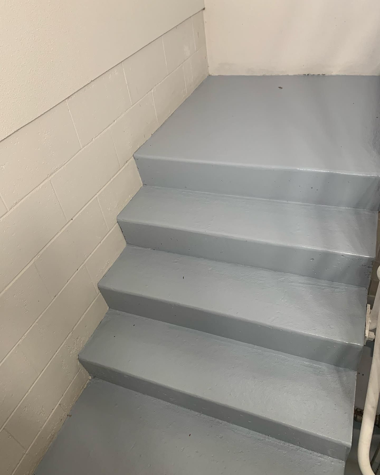 A Set of Stairs Leading Up to a White Wall — Holster Painting Contractors In Port Macquarie, NSW