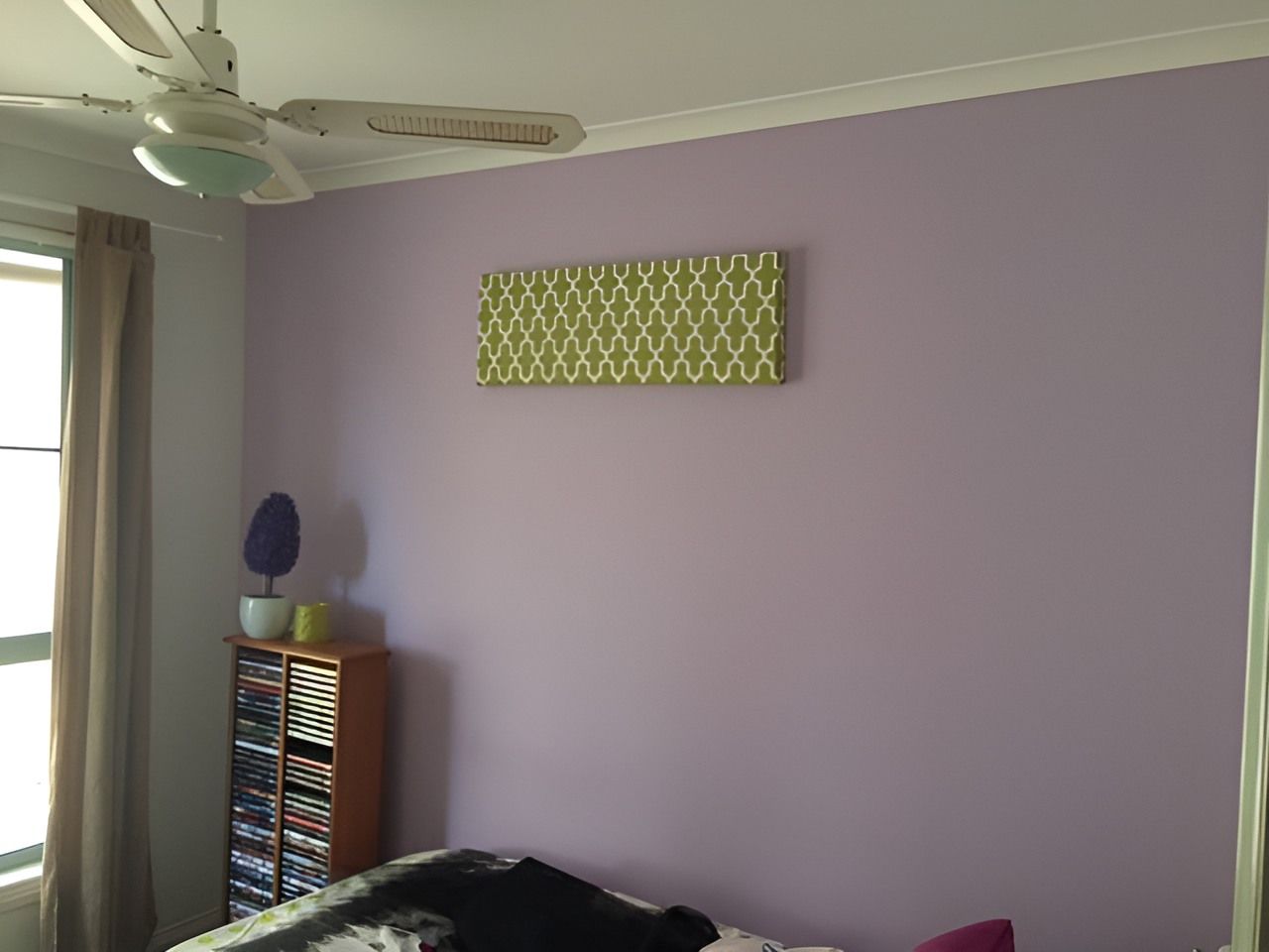 A Bedroom With Purple Walls and a Ceiling Fan — Holster Painting Contractors In Port Macquarie, NSW 