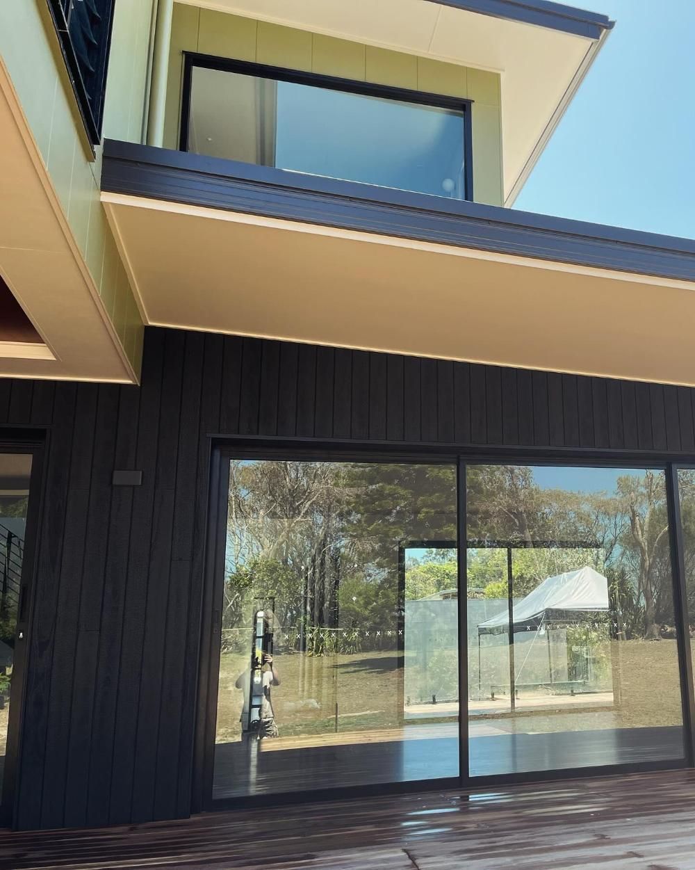 A Large House With a Lot of Windows and a Balcony — Holster Painting Contractors In Port Macquarie, NSW 