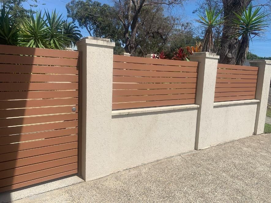 A Wooden Fence With a Gate in the Middle of It — Holster Painting Contractors In Port Macquarie, NSW