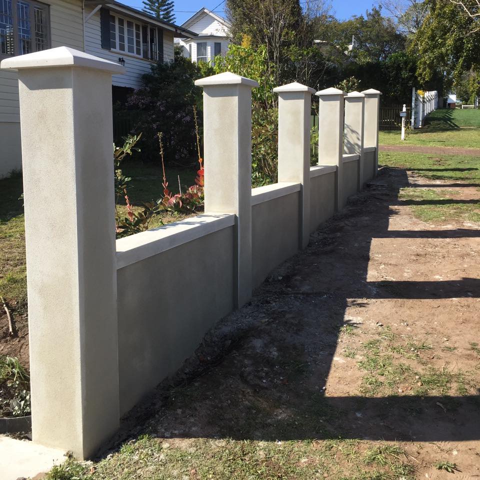 Cemented fence being built — House Rendering in Brisbane, QLD
