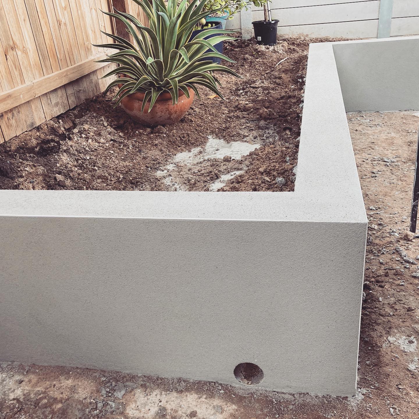 Cemented garden plot— Rock Solid Rendering Gallery in Brisbane, QLD