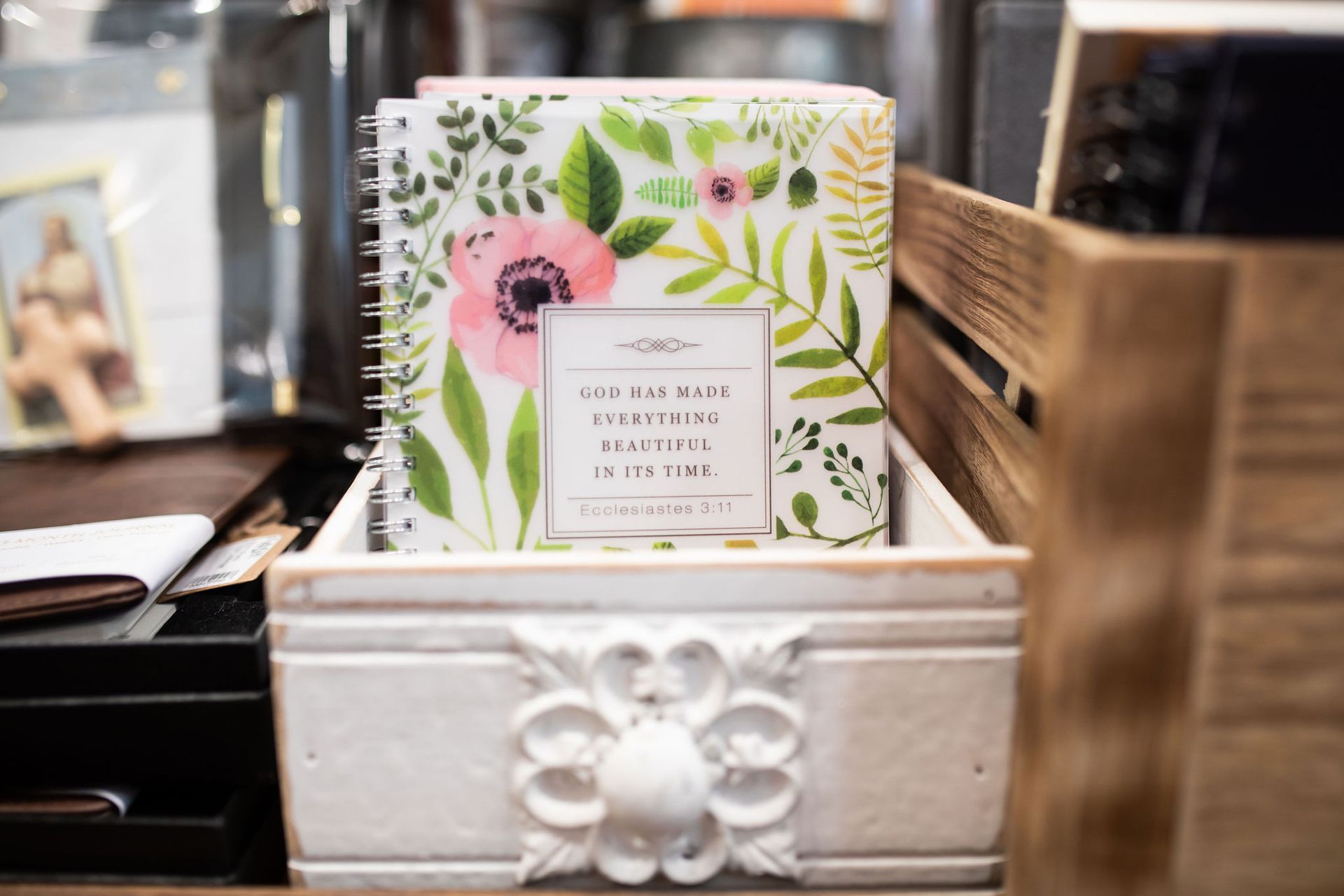 Floral journal in a white decorative wooden box with a quote.