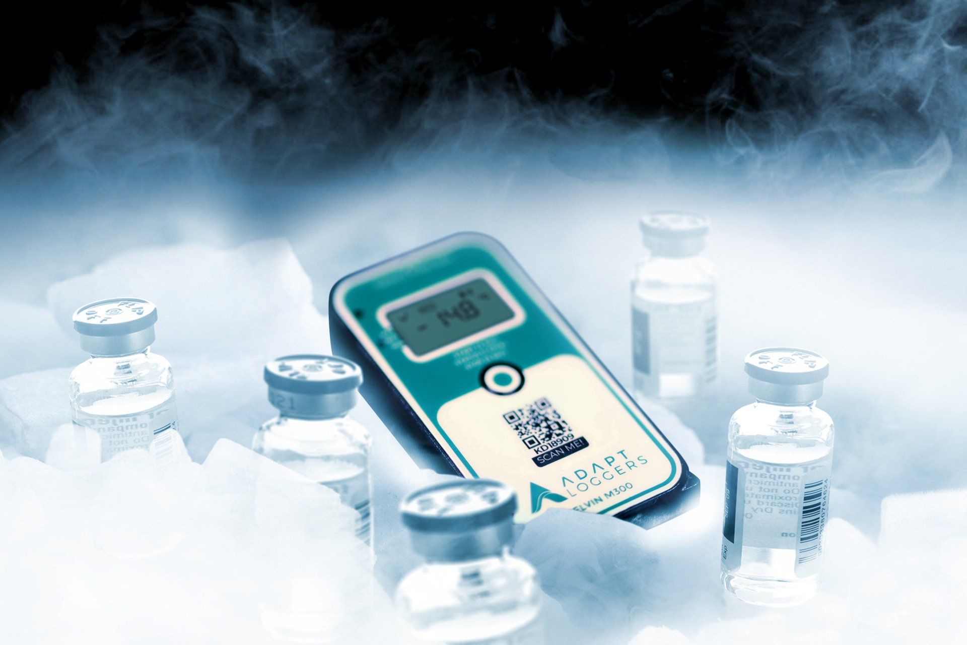 A cell phone is sitting on top of a pile of bottles.