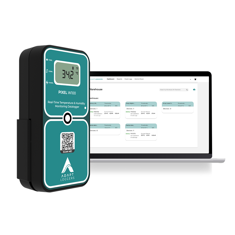 A thermometer is sitting next to a laptop computer.
