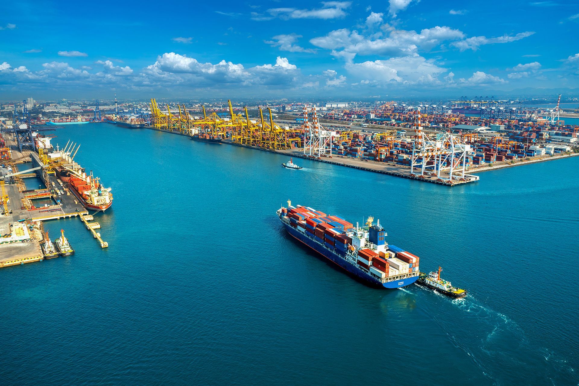 An aerial view of a large ship in a harbor.
