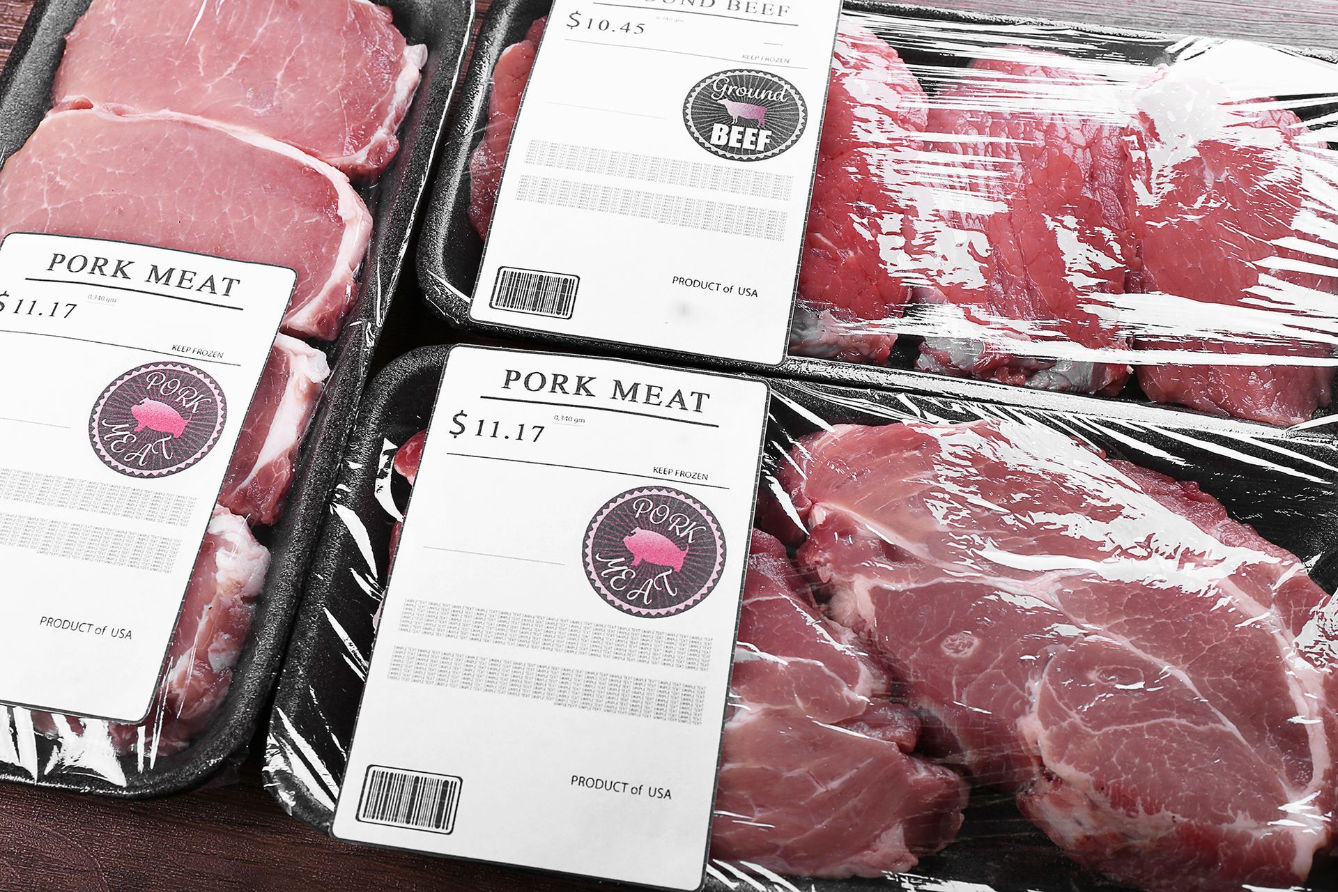 Meat goods need to be kept in very specific conditions during the transportation process. Two trays of pork meat with labels on them