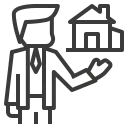 Real estate agent presenting a house model.