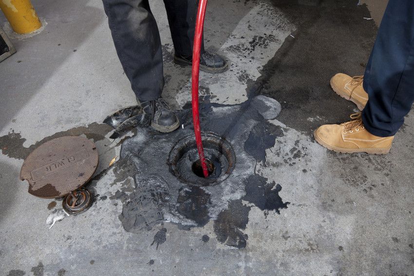 blocked drain being cleared