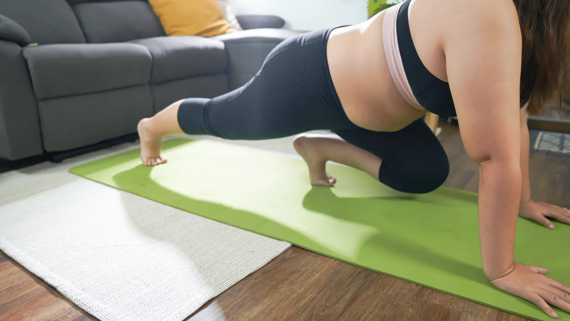 Postpartum core rebuilding workout illustration showing a new mom exercising
