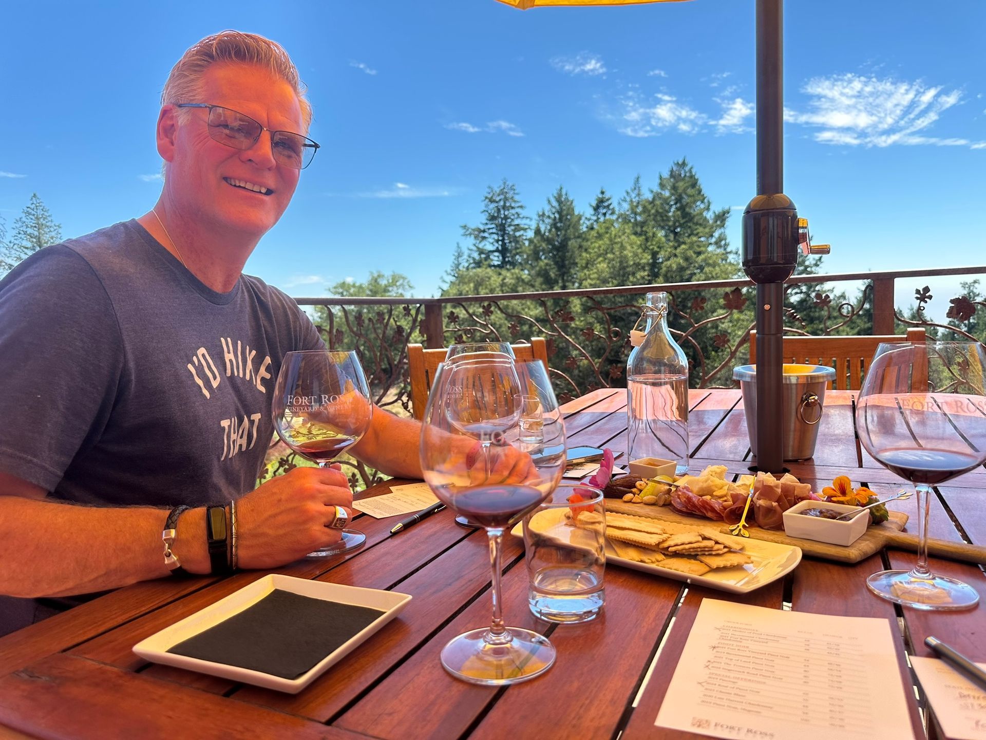 Client enjoying a meal outdoors during travel-ready strength progress