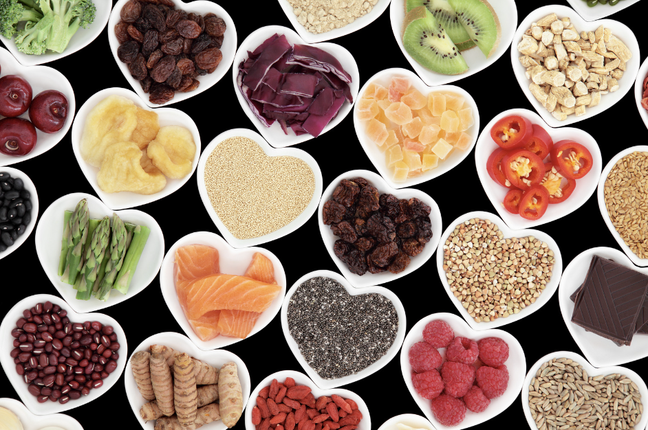 Healthy foods arranged in heart-shaped dishes