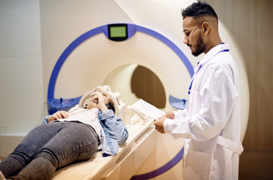Patient receiving MRI scan for lumbar spine and sciatica assessment