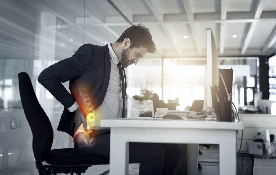 Businessman with poor posture showing need for ergonomic seating