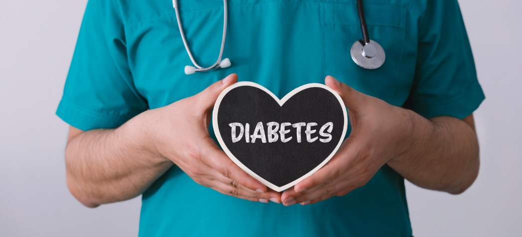 Healthcare provider holding diabetes heart symbol