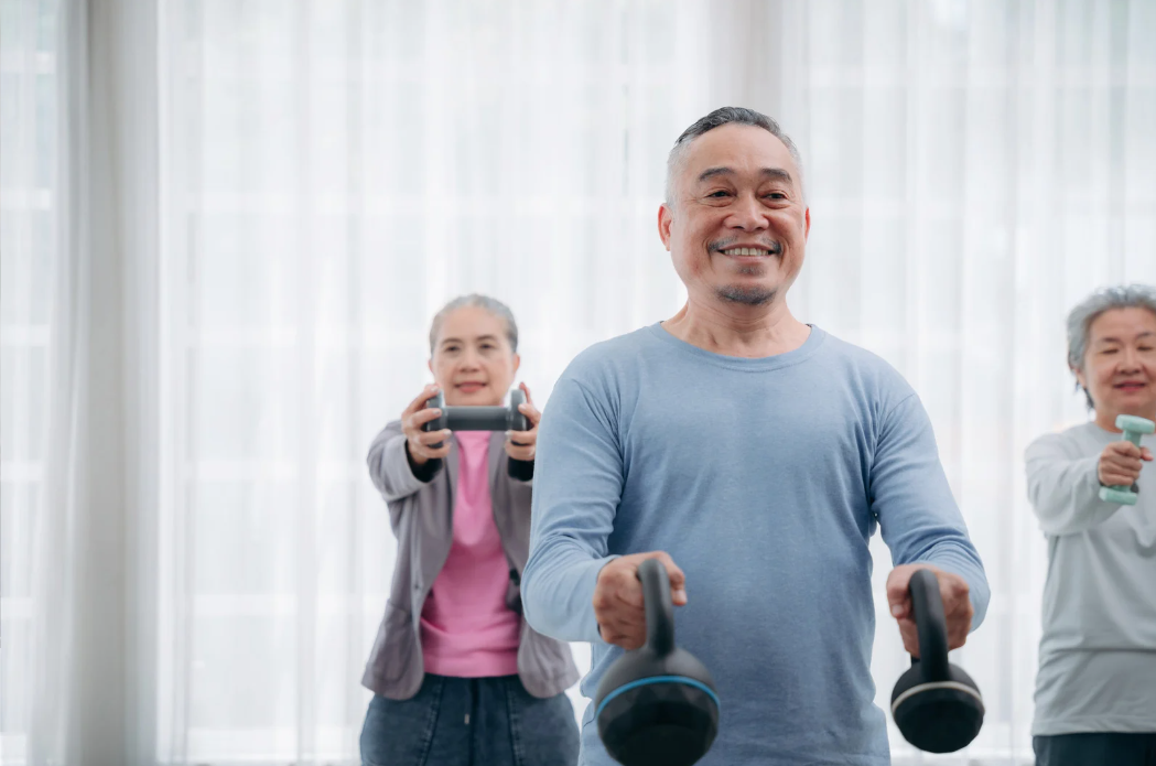 Adults exercising with Kettlebells for heart health and blood pressure support