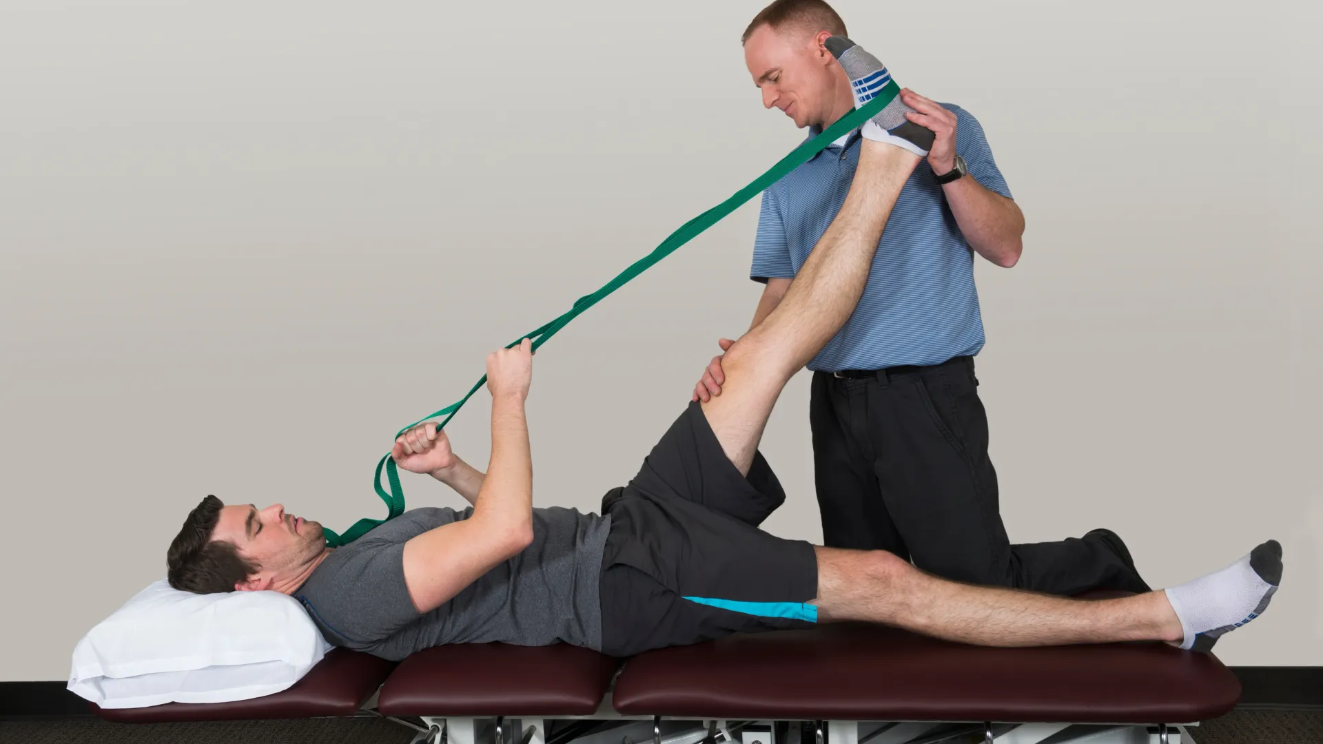 Person performing guided strength training as part of a post-physical therapy rehabilitation process