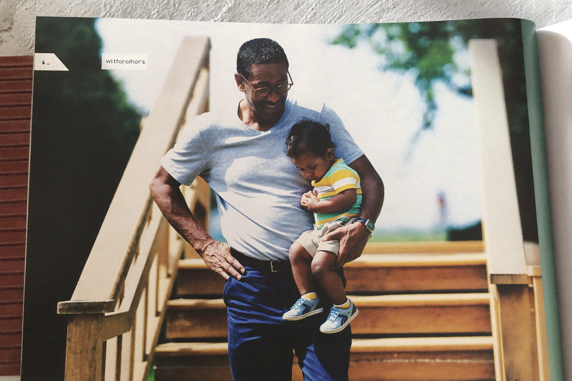 A mature adult carrying a grandchild up steps with ease, everyday functional strength.