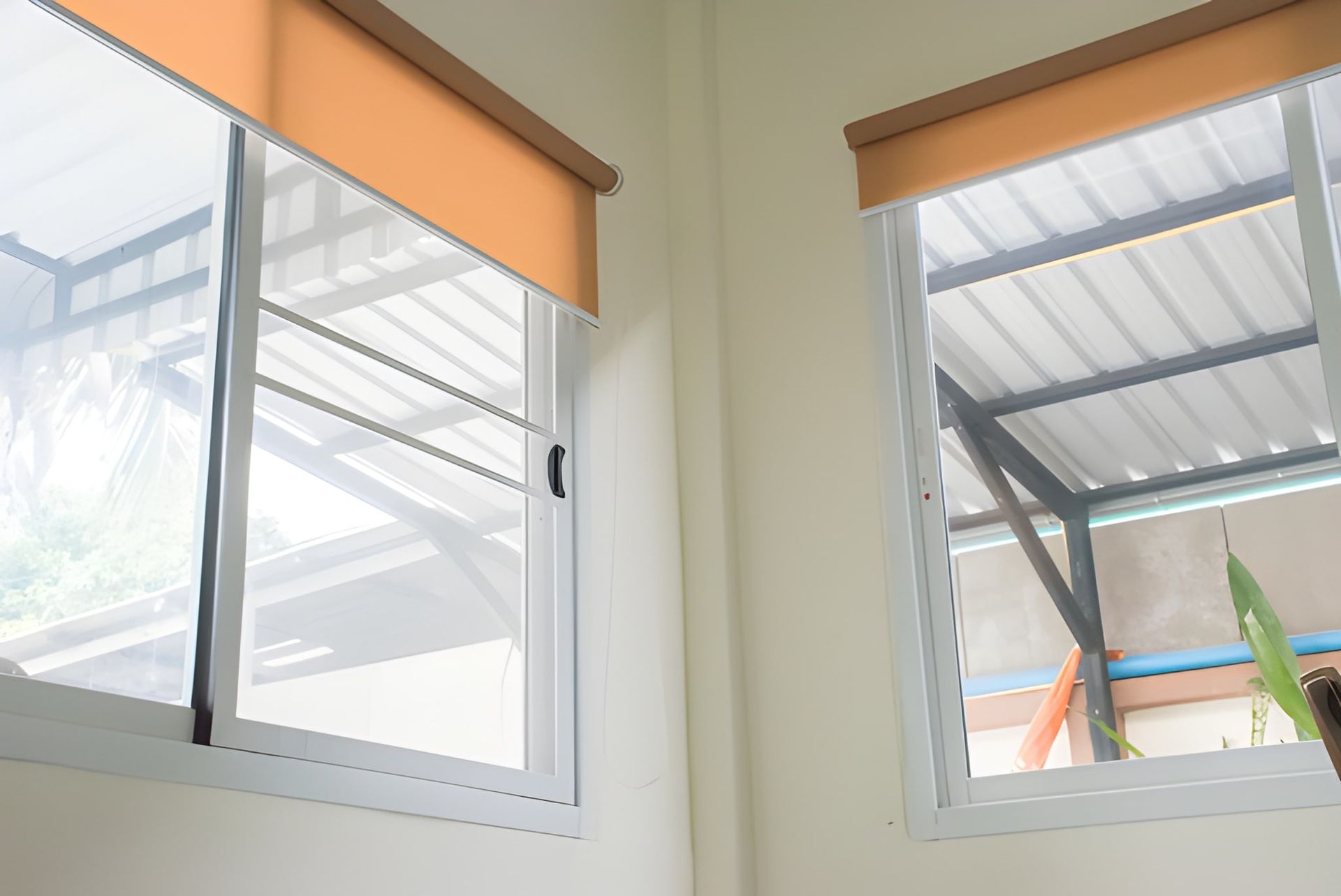Two Security Screen Windows in a Corner of a Room — K & J Glass in South West Rocks, NSW