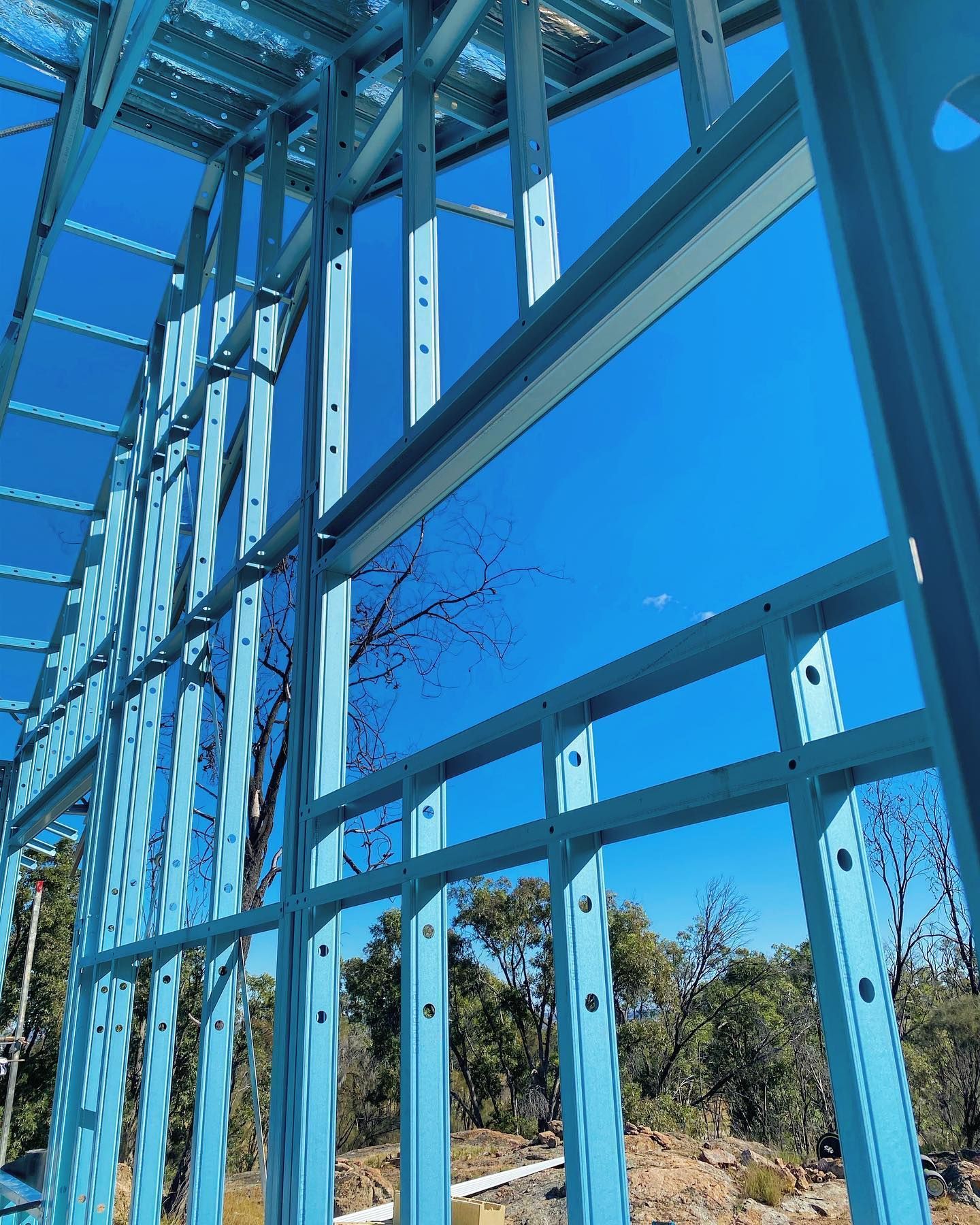 A Building Under Construction With a Blue Sky in the Background — Steel Frame Company In Orange, NSW