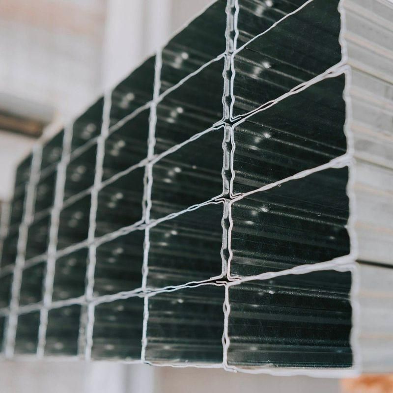 A Bunch of Metal Boxes Stacked on Top of Each Other — Steel Frame Company In Maitland, NSW