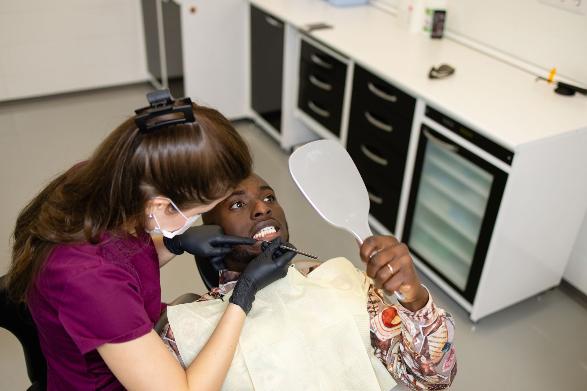 Man with a pain-free smile | Locate an emergency dentist in Four Corners, FL.
