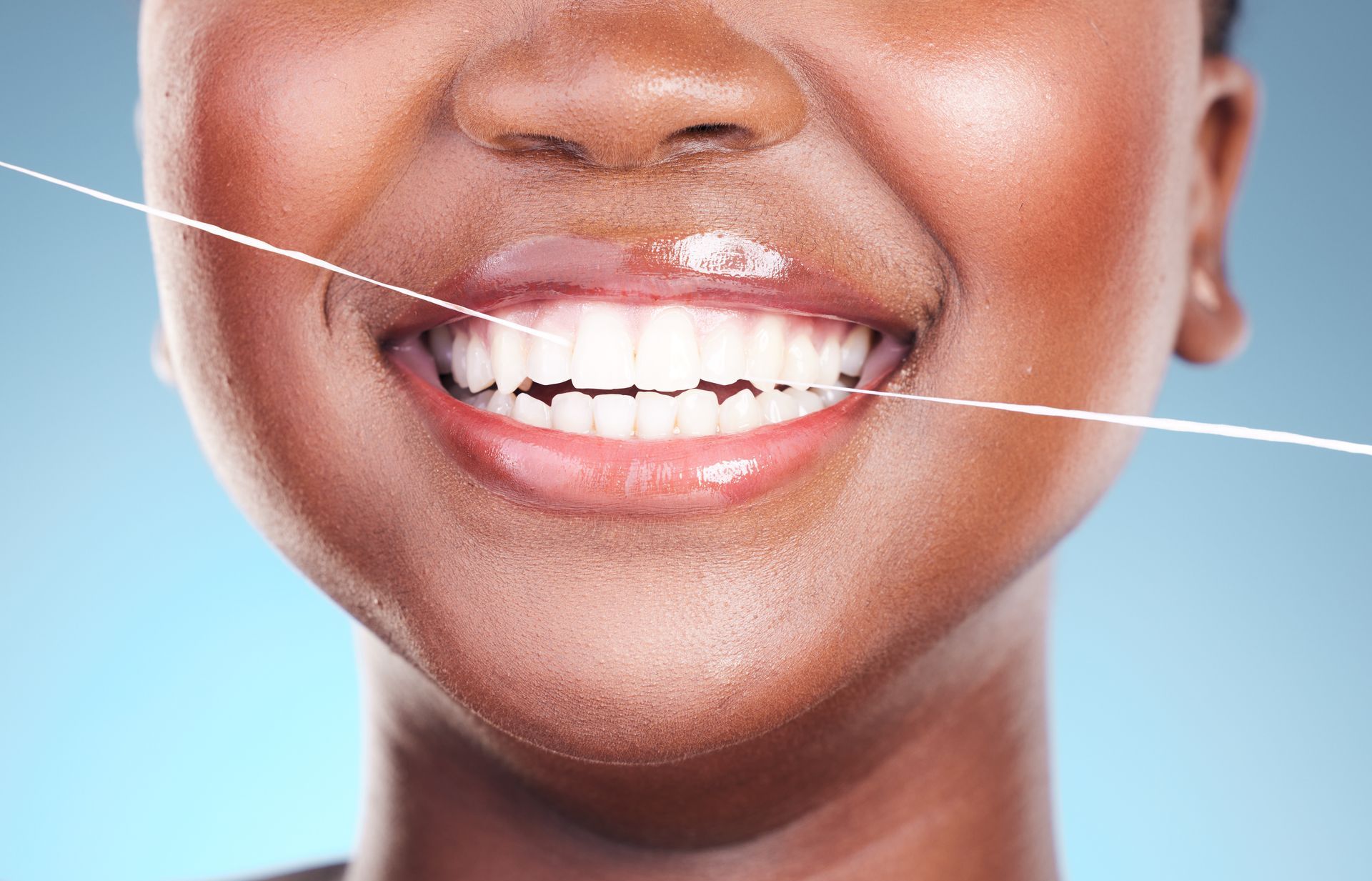 Woman with healthy gums after treatment | Treat gum disease in Davenport, FL.