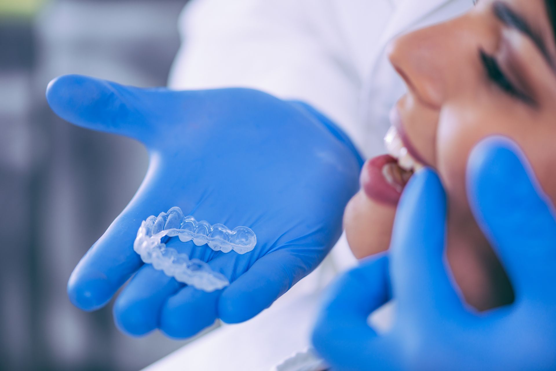 Woman with a stunning new smile | Visit a cosmetic dentist in Davenport, FL.