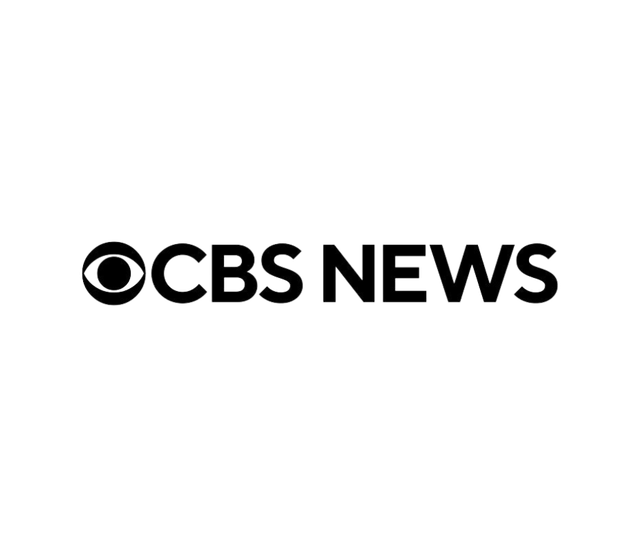 CBS News logo, black text and eye symbol on a white background.