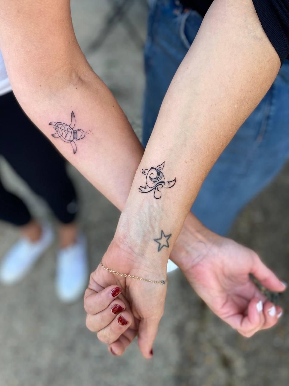 Delicate fine line tattoo with intricate detail and precisely executed thin linework