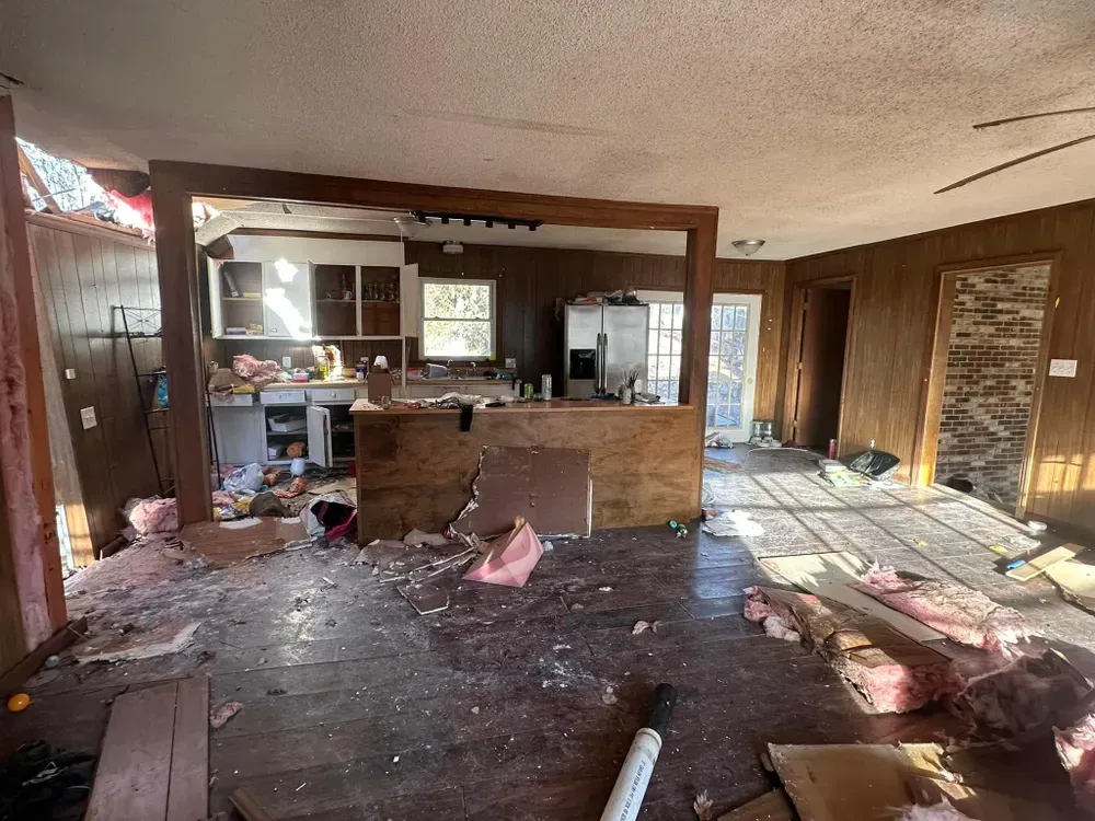 The inside of a house that has been damaged by a tornado.