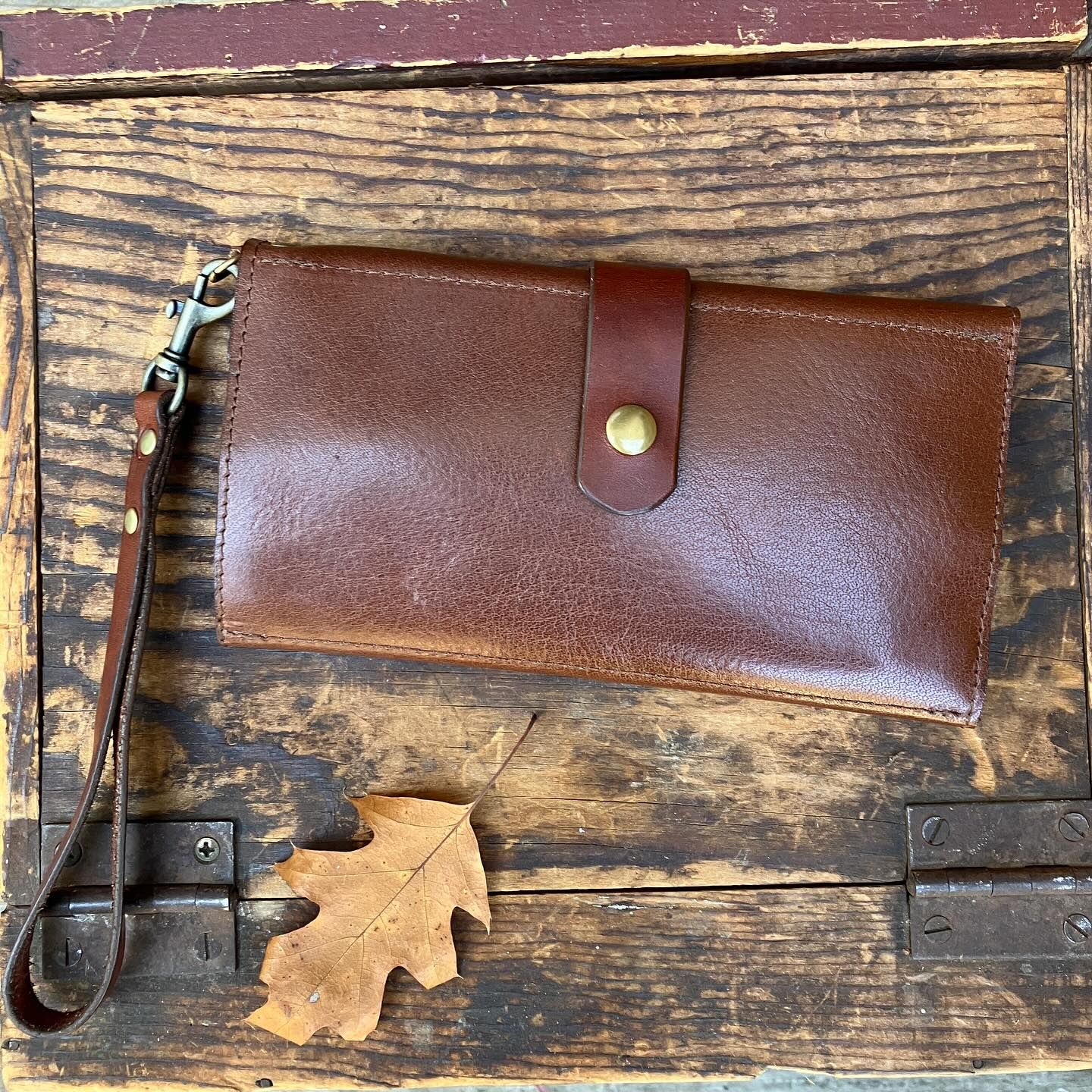 Custom leather wallet with hand strap