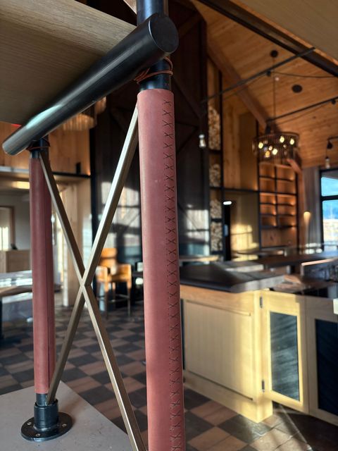 Stitched leather shelving wraps