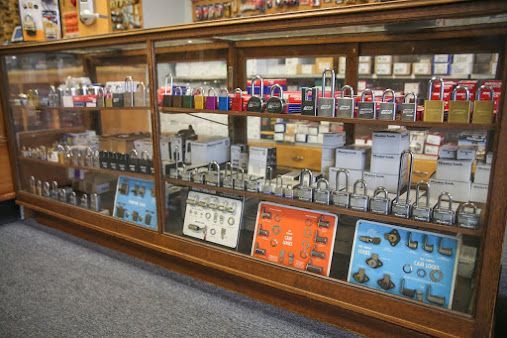 Display case filled with various locks and related hardware in a store. Display case filled with various locks and related hardware in a store.