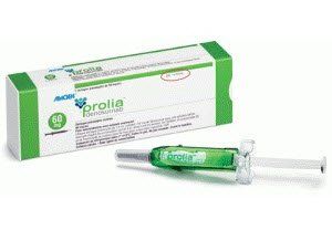 Box of Prolia injection and a prefilled syringe. White box with green accents.