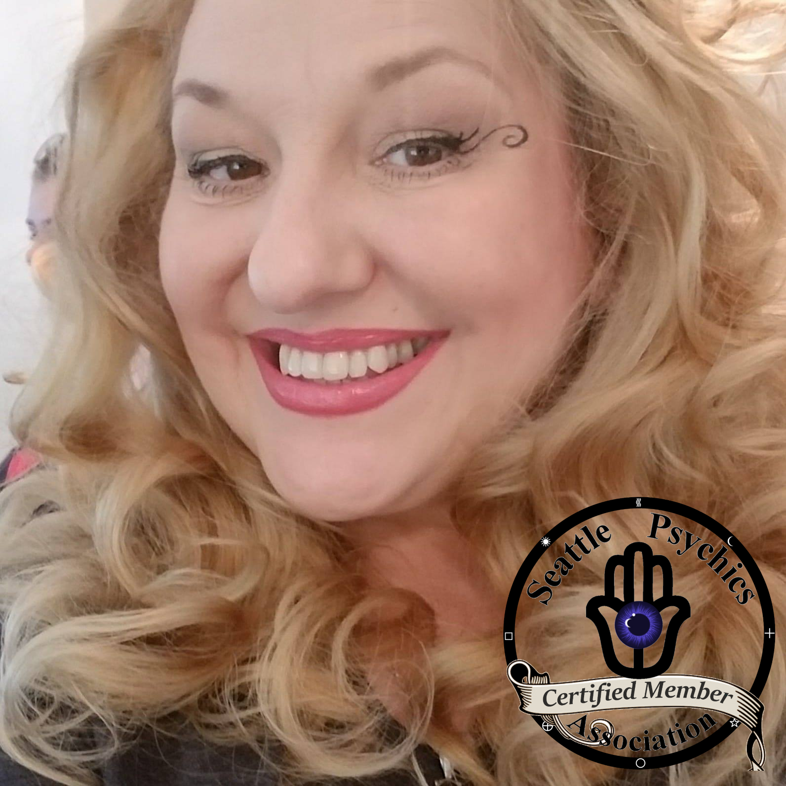 A certified member of the Spiritual professionals association is smiling