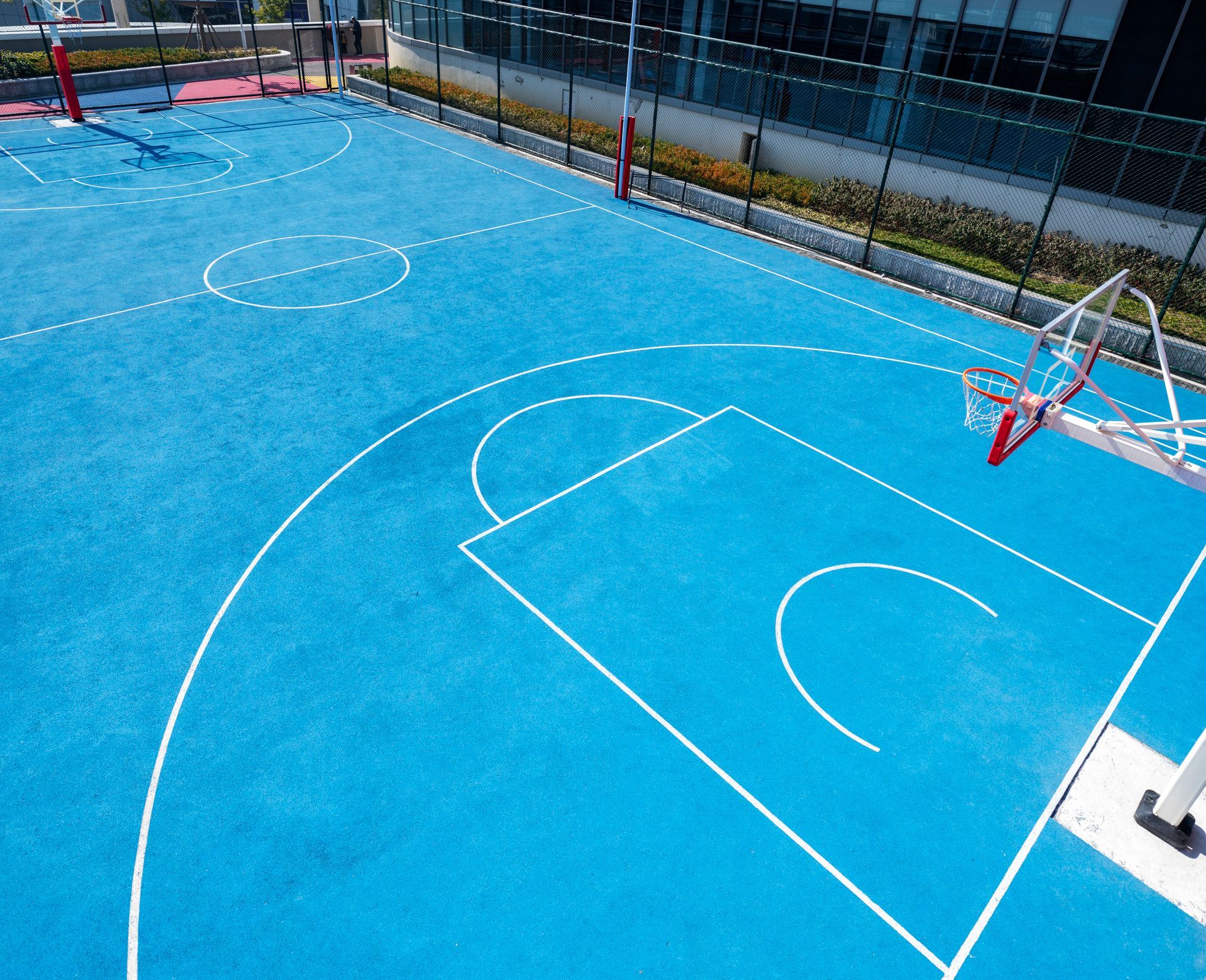Outdoor Blue Basketball Court.