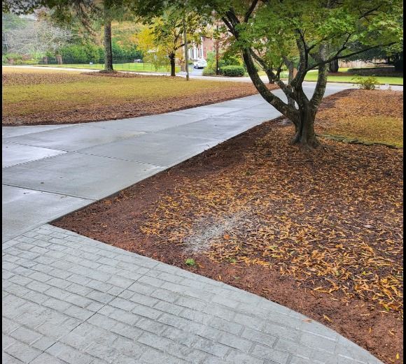 Wet Concrete Driveway, Mulch. Wet Concrete Driveway, Mulch.
