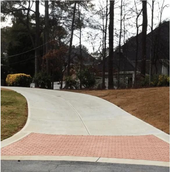 Curved Concrete Driveway Uphill.