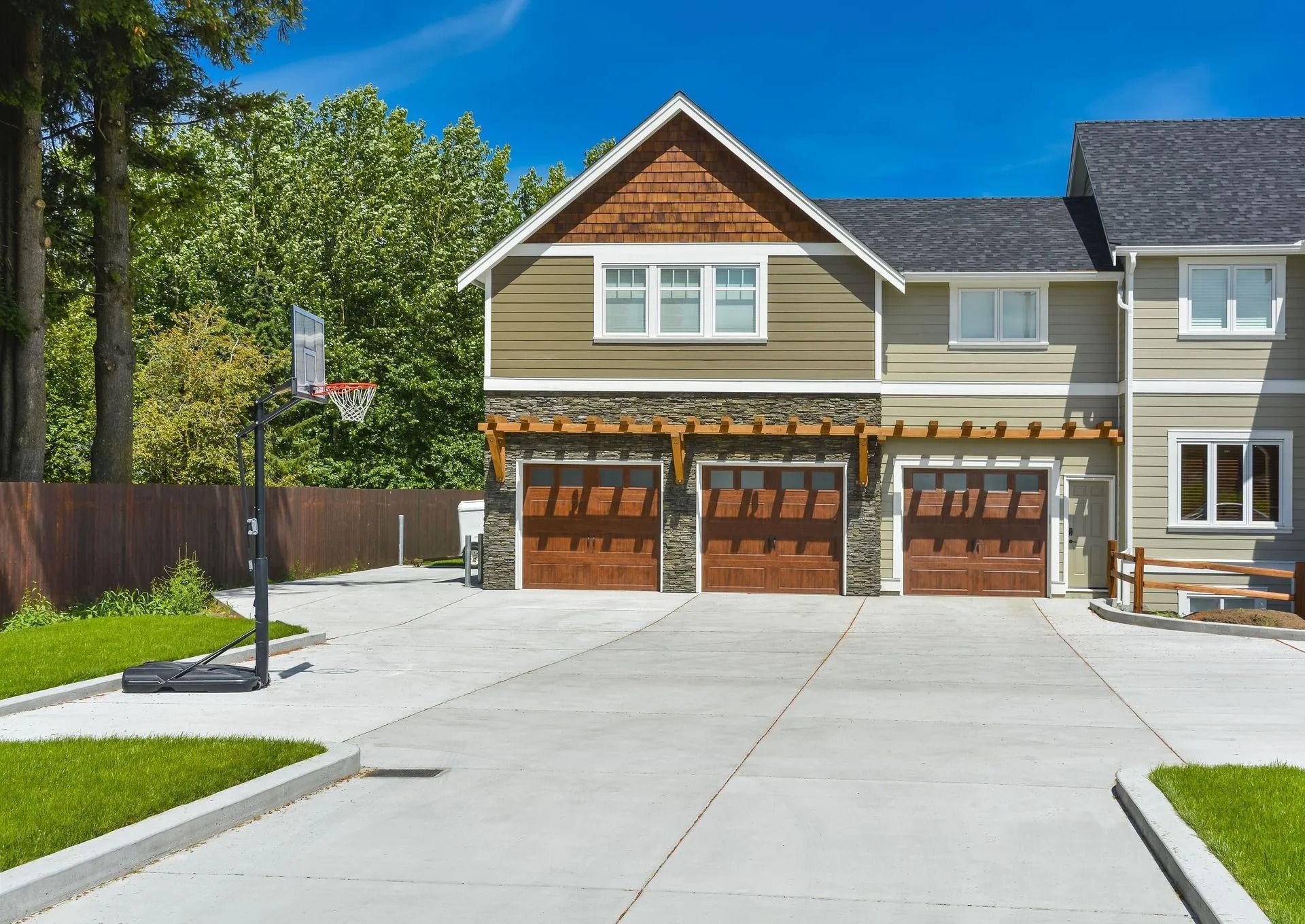 Three-Car Garage with Brown Doors — Tucker, GA — A-1 Driveway Replacement Company