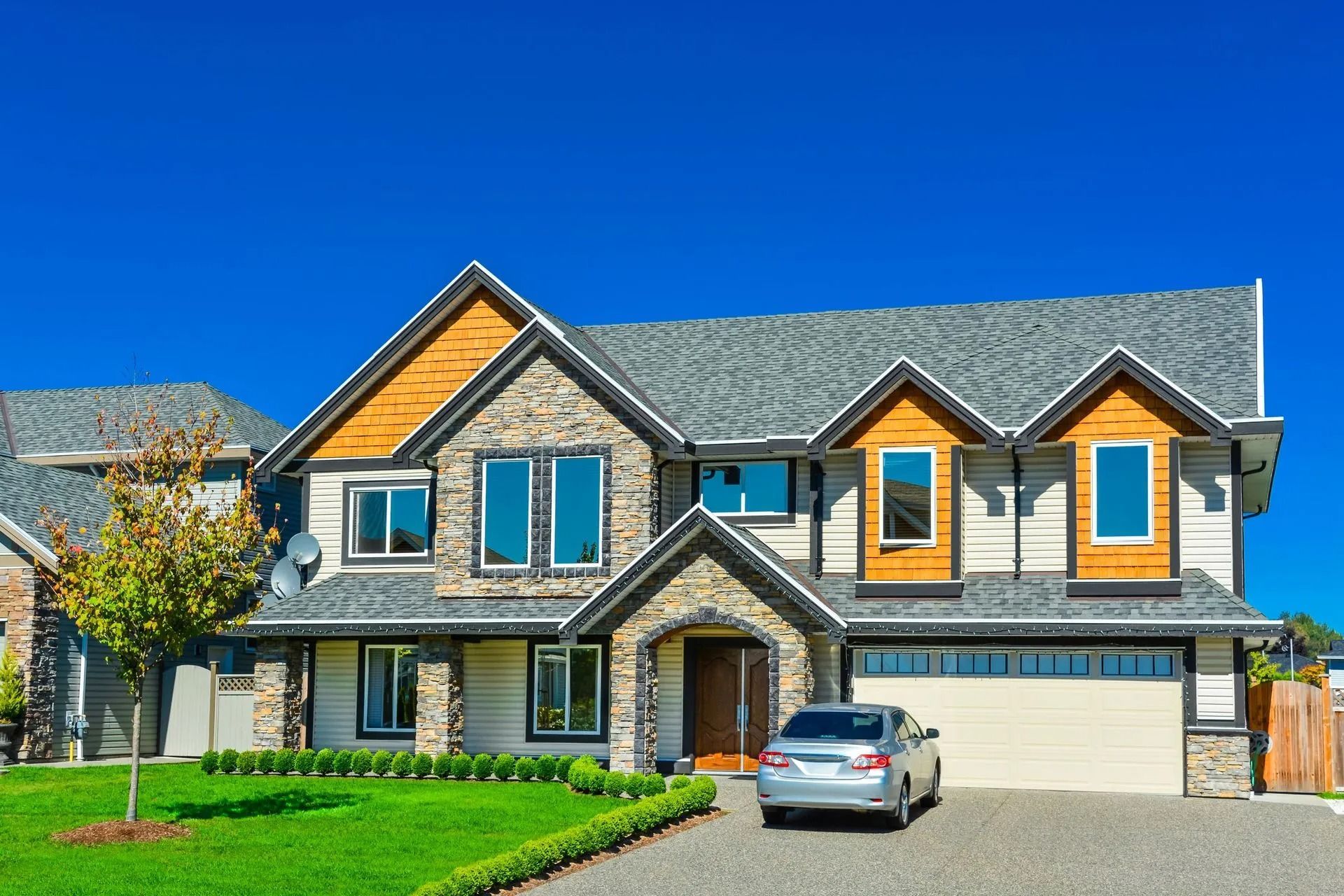 Two-Story House with Gray Stone Exterior — Tucker, GA — A-1 Driveway Replacement Company