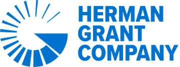 The herman grant company logo is blue and white