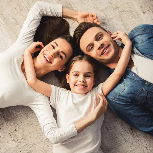 Image showing a young family protected by universal life insurance in Spartanburg.