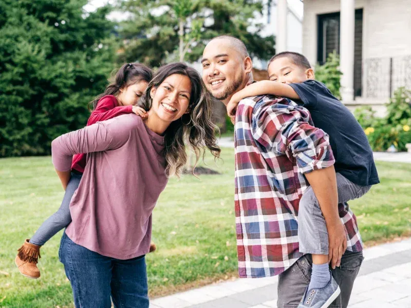 Image showing a happy young family after securing term life insurance in Spartanburg.