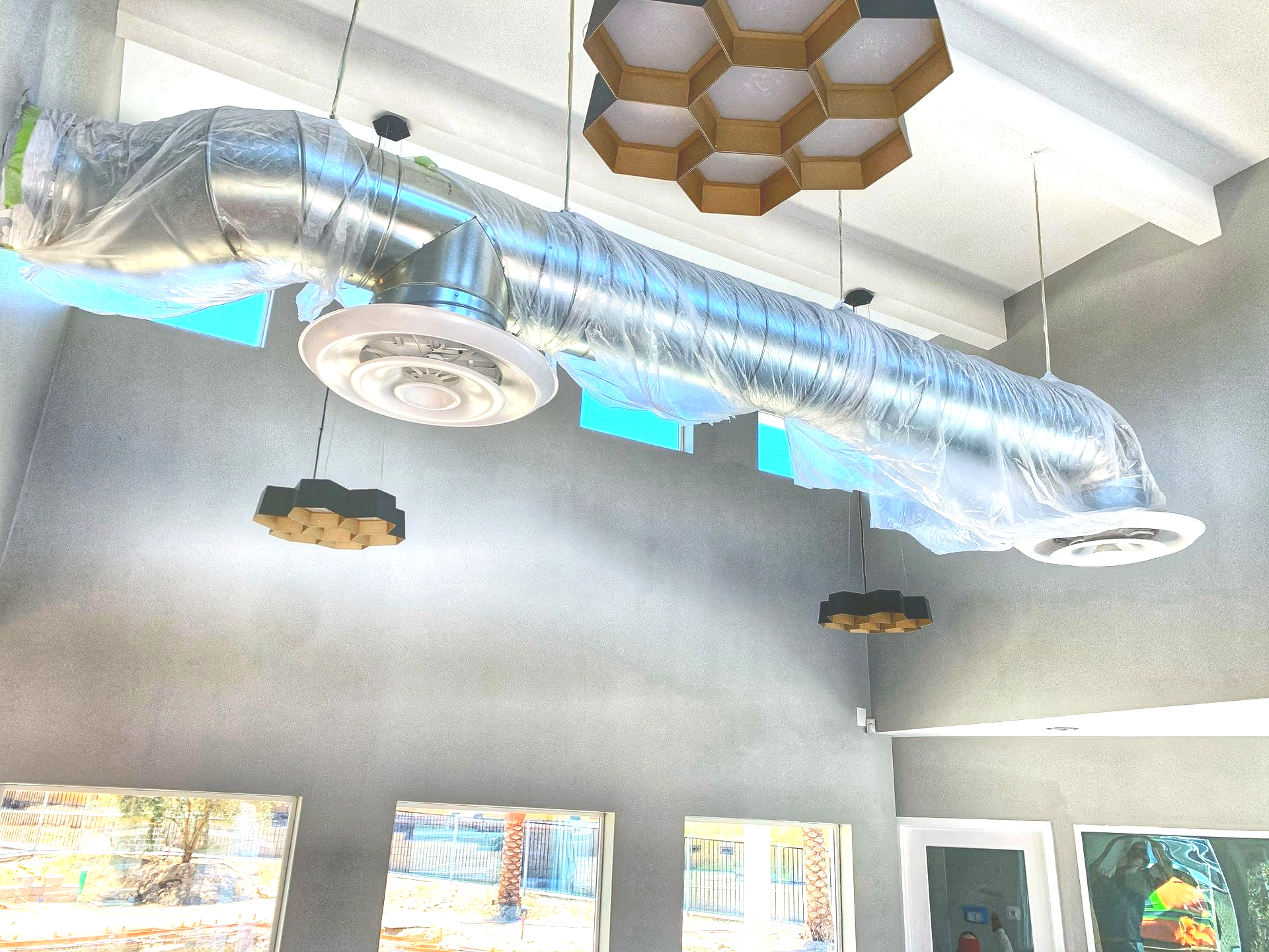 Exposed spiral ductwork for specialty HVAC installation