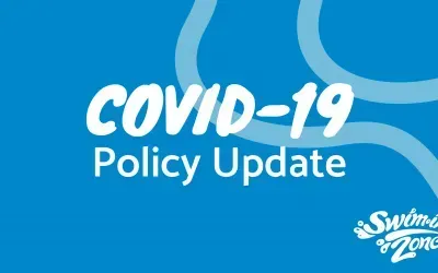 A blue background with white text that says covid-19 policy update
