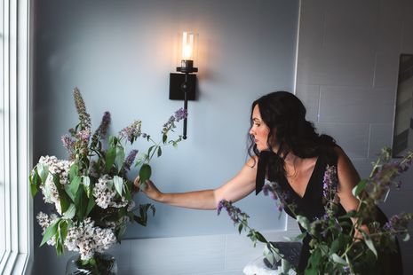 Liz Brooks decorating client bathroom with flowers