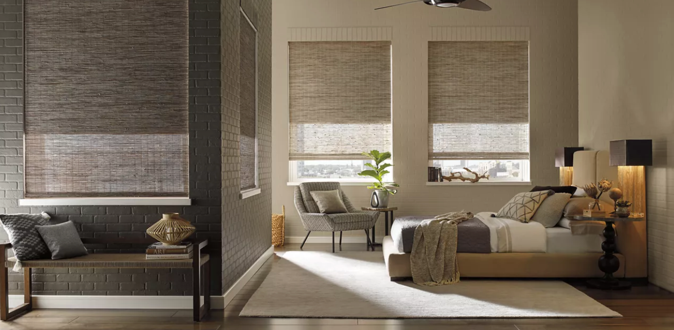 Hunter Douglas Provenance® Woven Wood Shades in a modern boho bedroom.
