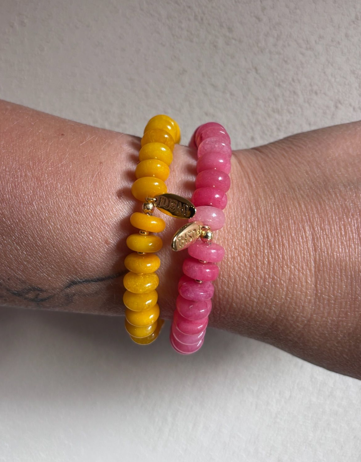 Armband halfedelsteen jade schijfjes geel